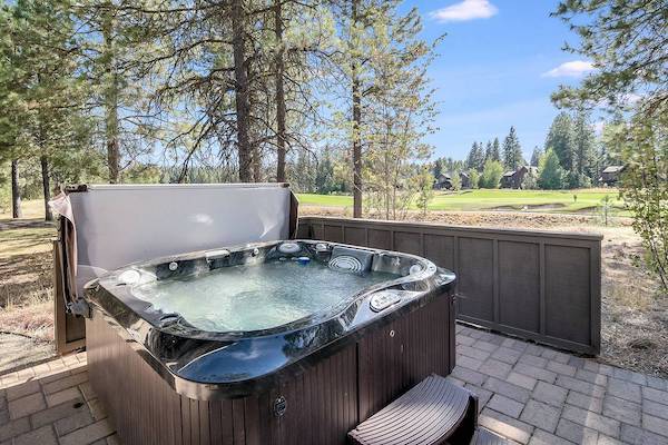 A private hot tub of a Cle Elum vacation rental